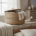 Farmhouse woven rattan storage bin with lid on bedroom shelf